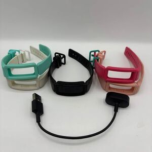 Fitbit Inspire Fitness Tracker Watch with multiple bands and charger